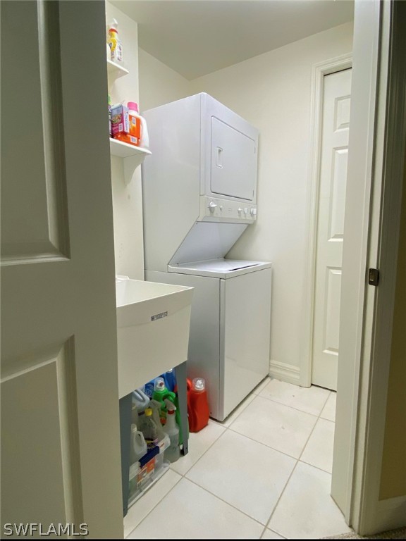 2797 First Street, Unit 1802 Fort Myers, FL 33916 - Photo 25 of 32 a utility room with dryer and washer