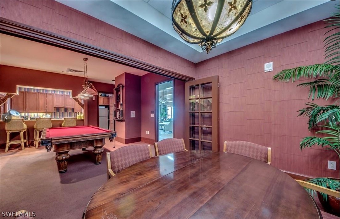 2797 First Street, Unit 1802 Fort Myers, FL 33916 - Photo 29 of 32 a living room with furniture a couch and potted plant