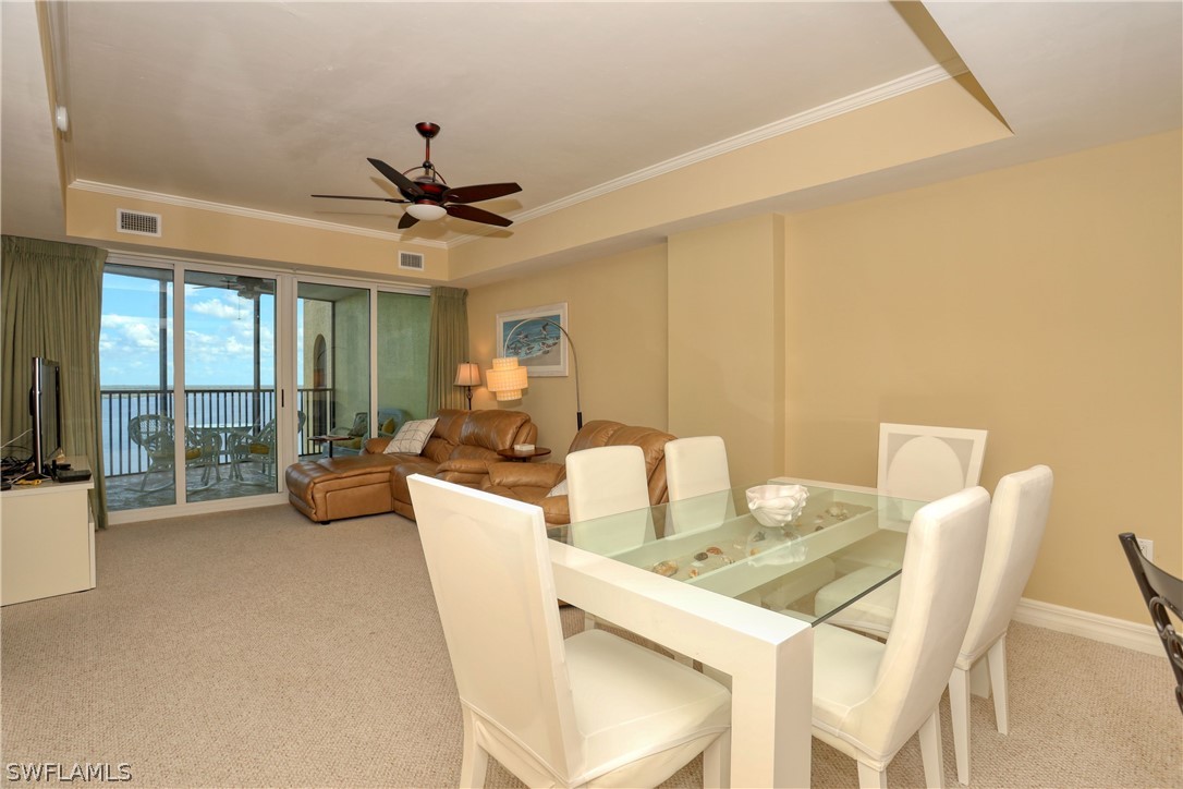 2797 First Street, Unit 1802 Fort Myers, FL 33916 - Photo 10 of 32 a view of a dining room with furniture window and outside view