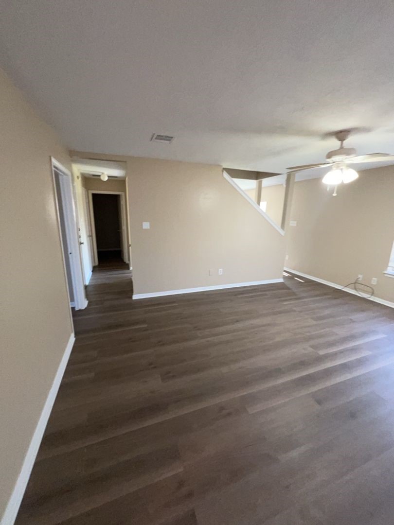 16410 Amy Ridge Road Houston, TX 77053 - Photo 2 of 17 a view of a hallway with wooden floor