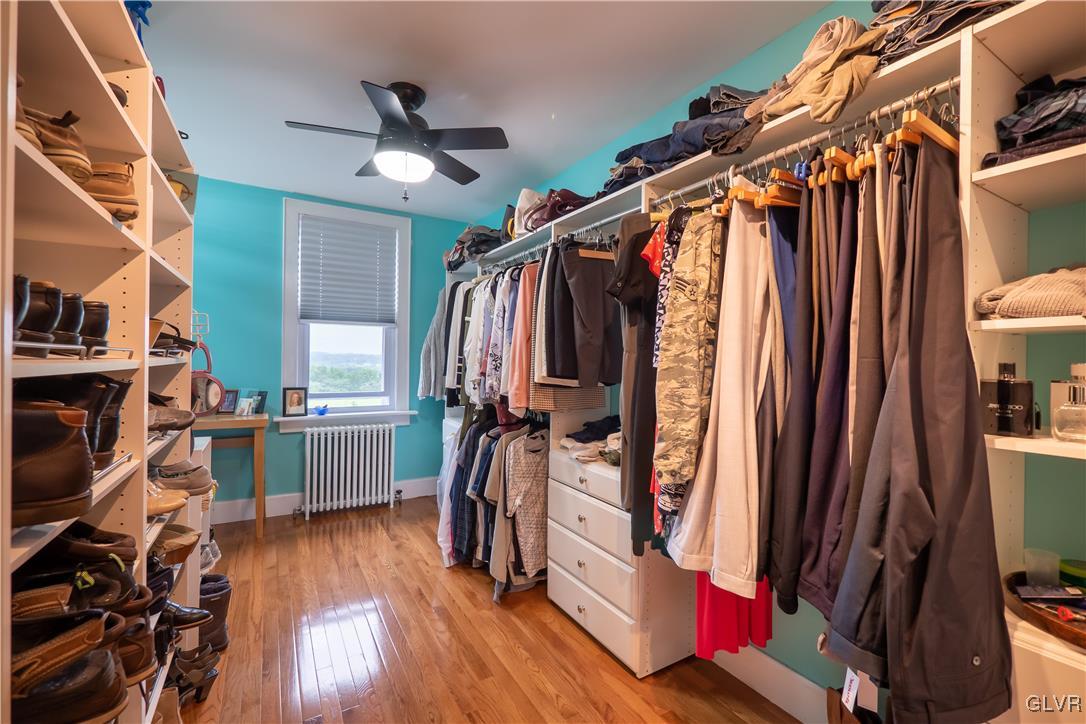 696 Cherry Hill Road Nazareth, PA 18064 - Photo 32 of 46 a view of walk in closet with clothes and shoes