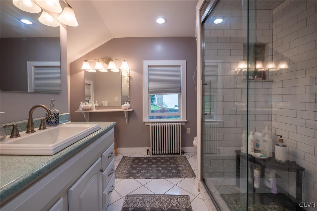 696 Cherry Hill Road Nazareth, PA 18064 - Photo 34 of 46 a bathroom with a sink a toilet and shower