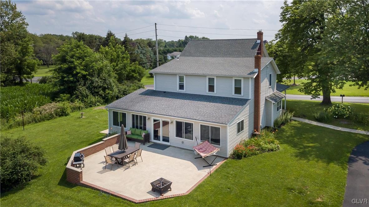 696 Cherry Hill Road Nazareth, PA 18064 - Photo 46 of 46 a aerial view of a house with a yard table and chairs