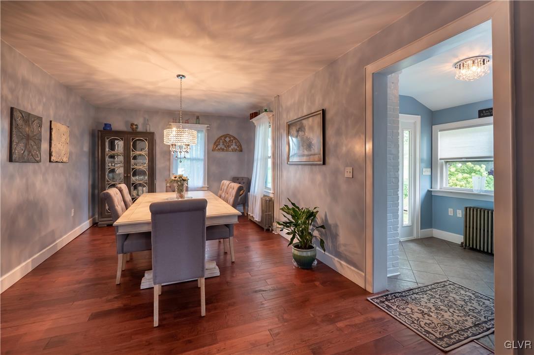 696 Cherry Hill Road Nazareth, PA 18064 - Photo 8 of 46 a view of a dining room with furniture and wooden floor