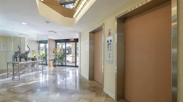 a view of a hallway and dining room