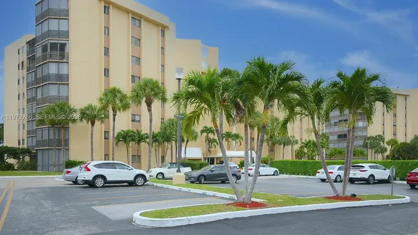 a cars parked in front of a building