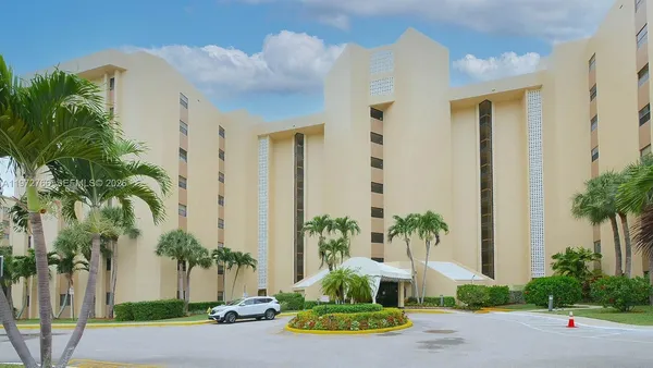 a view of a cars parked in front of a building
