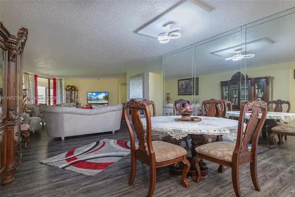 a view of a dining room with furniture