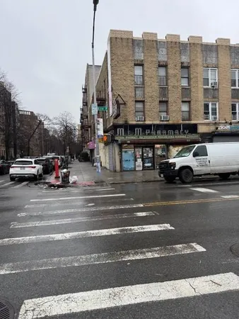 a buildings with a sink and a car parked