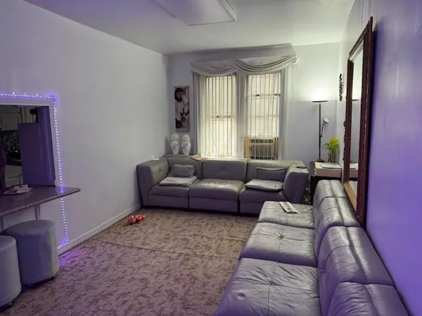 a view of a living room with furniture