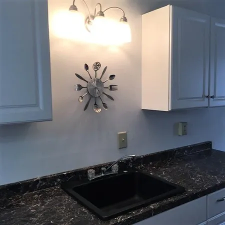 a kitchen with a stove and a microwave