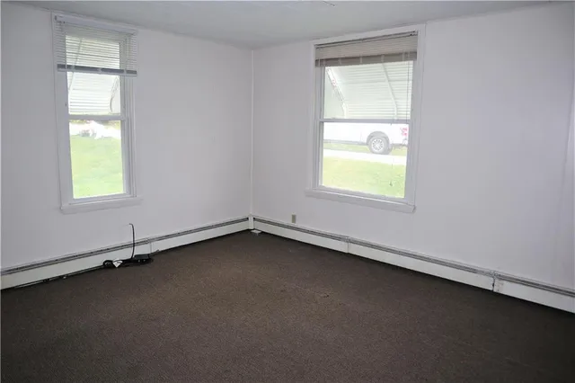 a view of an empty room and window