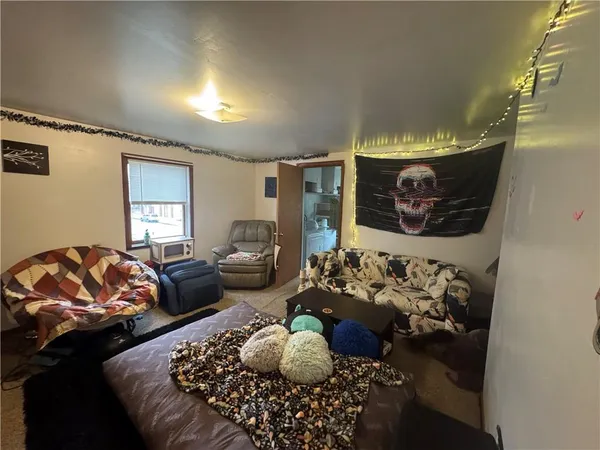 a bed room with furniture and a couch