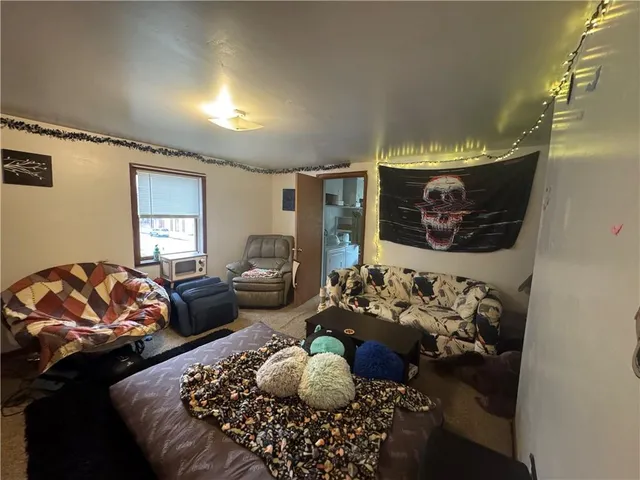 a bed room with furniture and a couch