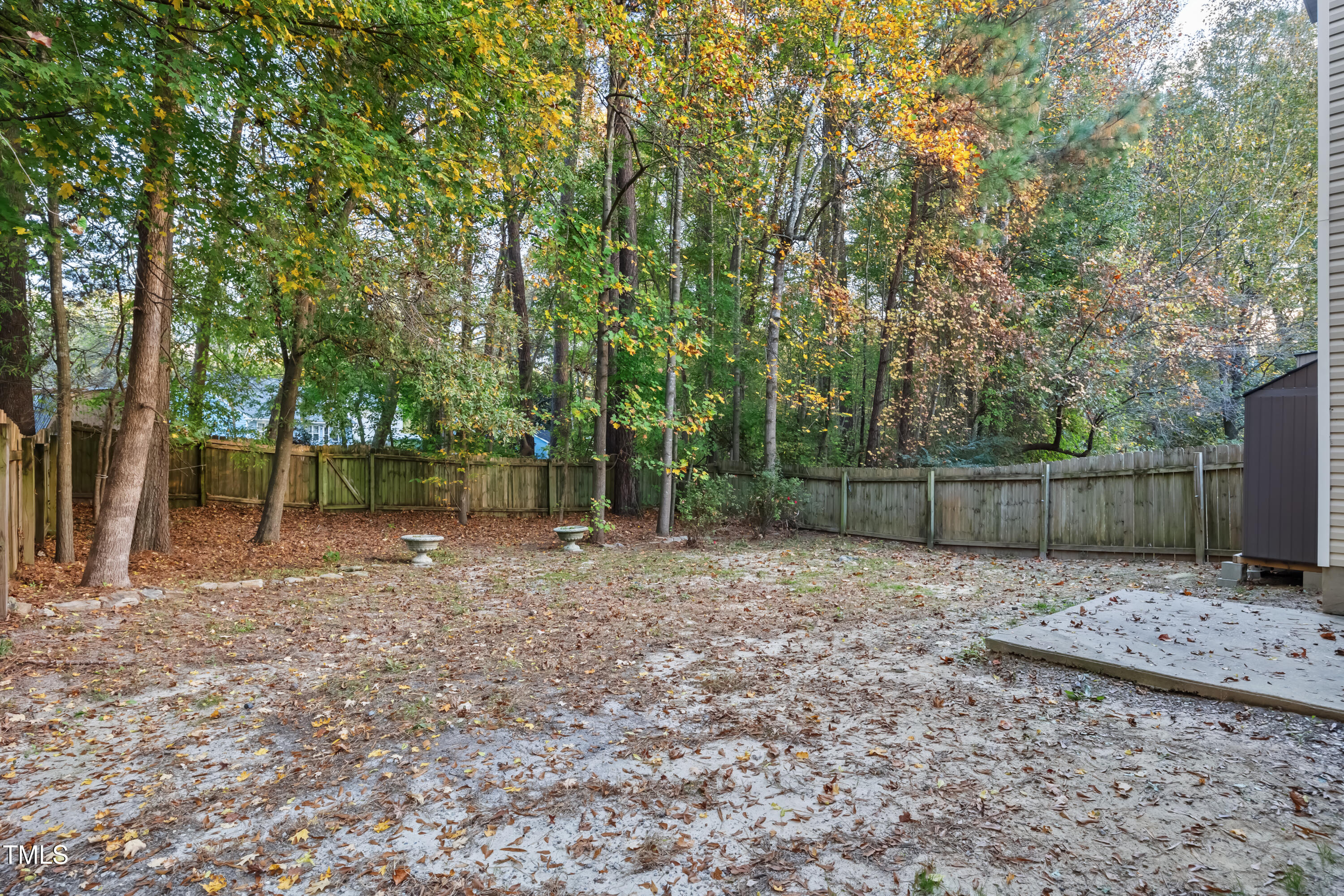1317 Swingline Way Raleigh, NC 27610 - Photo 21 of 23 1317 fully fenced Backyard
