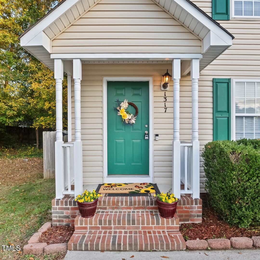 1317 Swingline Way Raleigh, NC 27610 - Photo 23 of 23 1317 Natural Twilight.Front