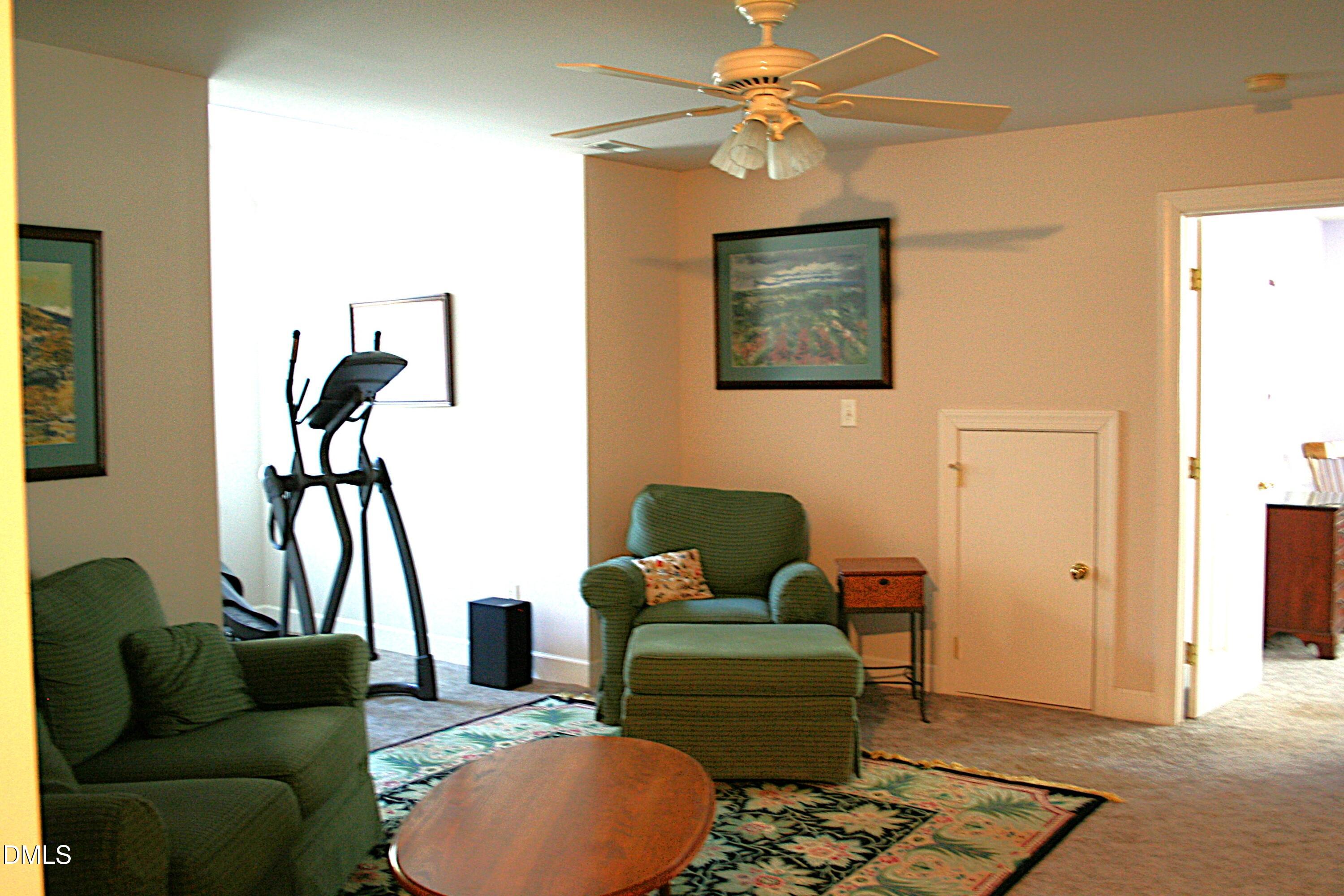 220 Jordan Narron Road Selma, NC 27576 - Photo 51 of 87 a living room with furniture and a window