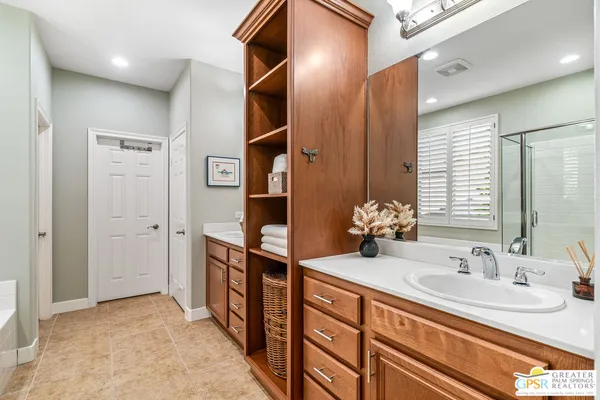 a bathroom with a shower and a bathtub