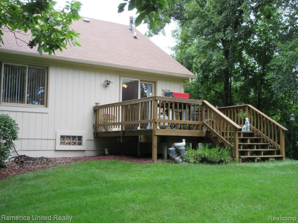 27465 Martindale Road New Hudson, MI 48165 - Photo 38 of 42 DECK FOR YOUR ENJOYMENT