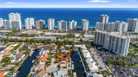 a view of a park with swings and slides