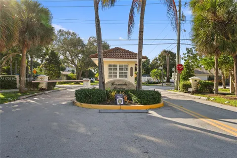 a view of a park with palm trees