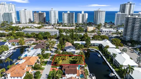 an aerial view of residential building and trees