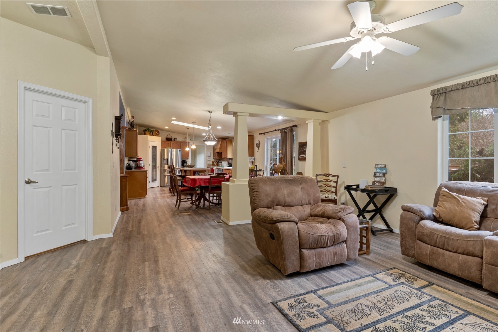 146 Labarre Road Chehalis, WA 98532 - Photo 16 of 37 a living room with furniture and a wooden floor