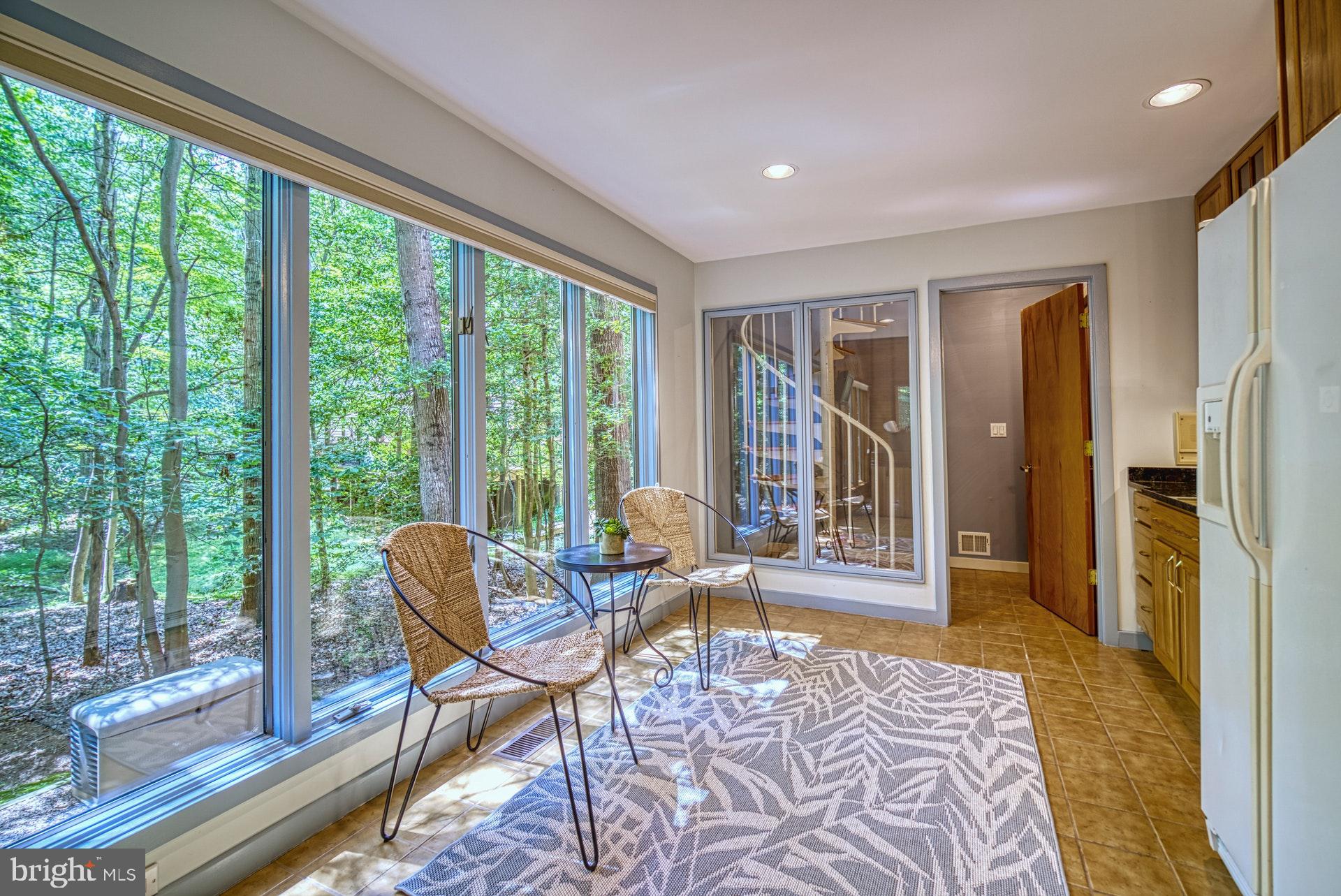 11403 Fieldstone Lane Reston, VA 20191 - Photo 22 of 48 Sunroom with circle stairway to Master Bedroom