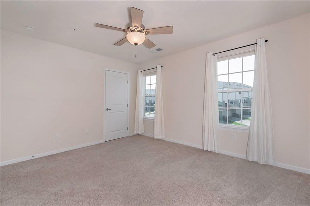 614 Rosecliff Road Wexford, PA 15090 - Photo 15 of 23 This is the second bedroom showing the ceiling fan and entry to the closet. THE DRAPES AND NOT INCLUDED IN THE SALE but the custom blinds will stay.