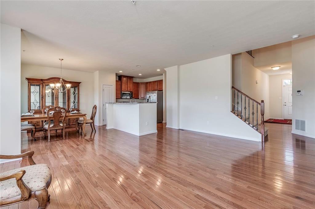 614 Rosecliff Road Wexford, PA 15090 - Photo 6 of 23 This view is from the living area looking at the dining area, entry and kitchen. The table and chairs and china cabinet is for sale separate from the sale of the home.