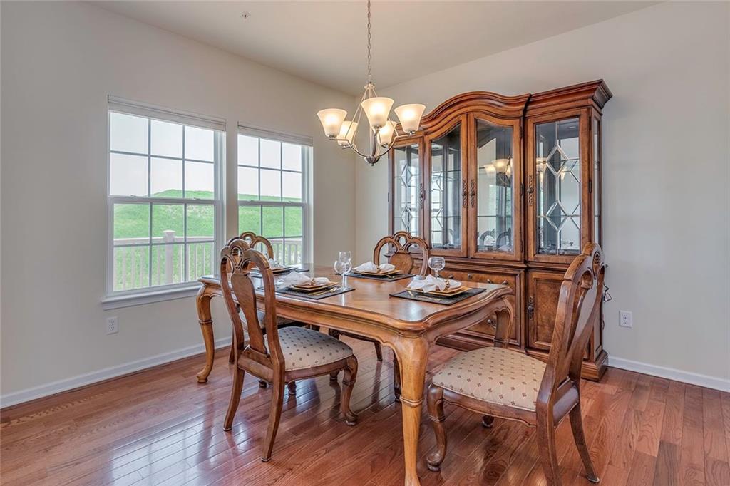 614 Rosecliff Road Wexford, PA 15090 - Photo 7 of 23 This shows the beautiful dining set which is for sale not included in the sale of the home. Also notice the great view.