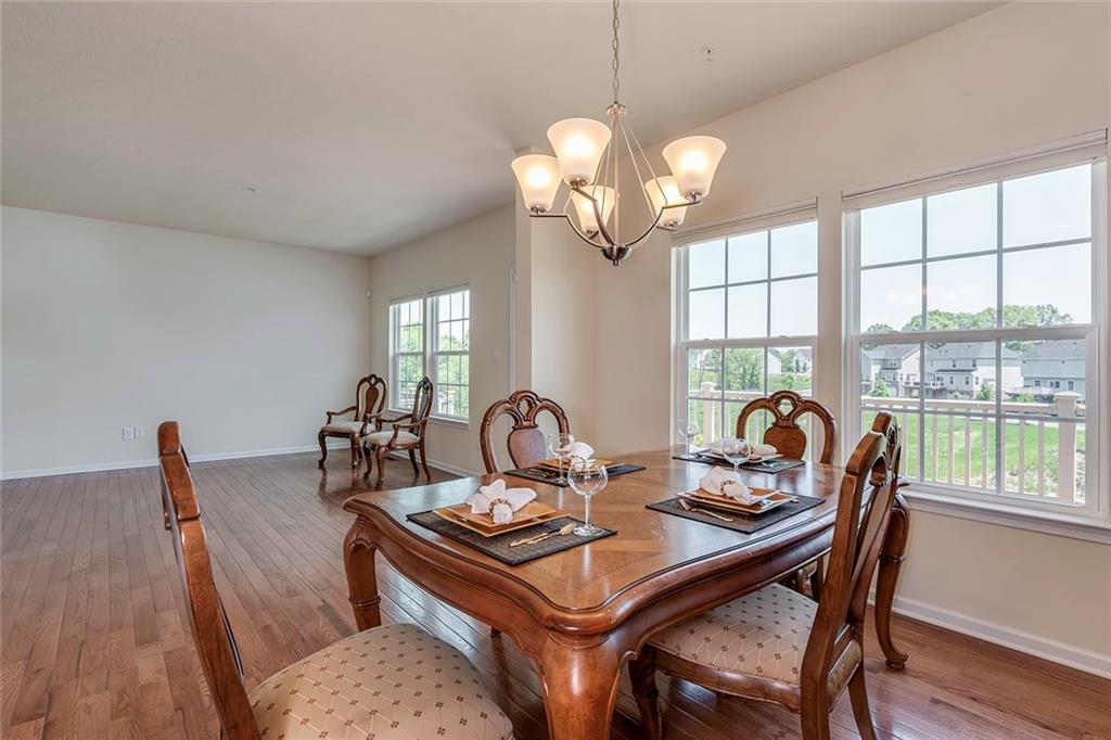614 Rosecliff Road Wexford, PA 15090 - Photo 8 of 23 This shows how much room in this home and the great view from the living and dining rooms also you can notice the deck.