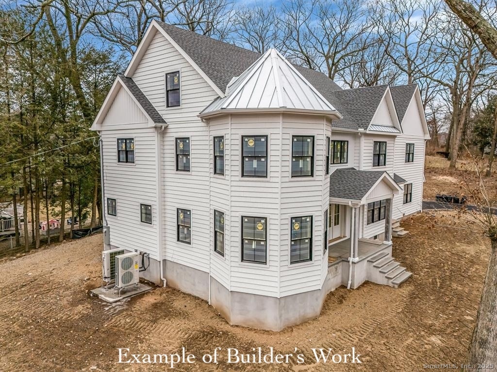 360 Duck Farm Road Fairfield, CT 06824 - Photo 10 of 10 a front view of a house with a yard