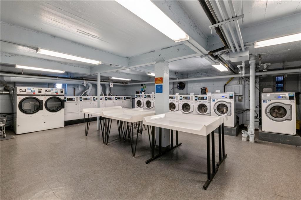 601 79th Street, Unit E10 Brooklyn, NY 11209 - Photo 13 of 14 a utility room with multiple appliances and furniture
