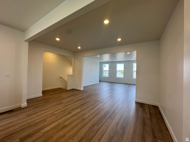 1883 West 1575th North, Unit 236 Layton, UT 84041 - Photo 9 of 22 Unfurnished living room featuring dark wood-type flooring and recessed lighting