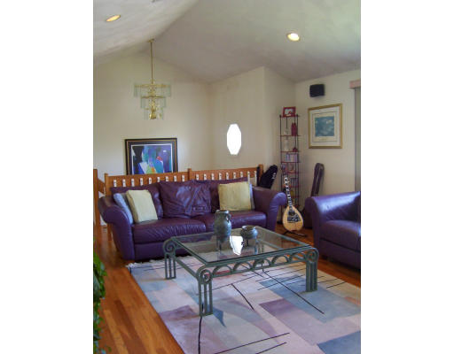 17 Evelyn Road Needham, MA 02494 - Photo 6 of 8 a living room with furniture and a couch
