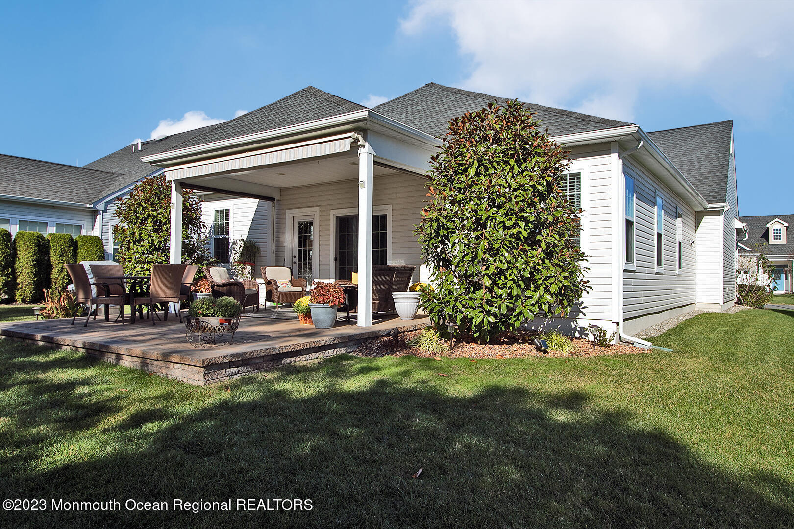 39 Bayville Way Waretown, NJ 08758 - Photo 3 of 55 a view of a house with a big yard potted plants and floor to ceiling window