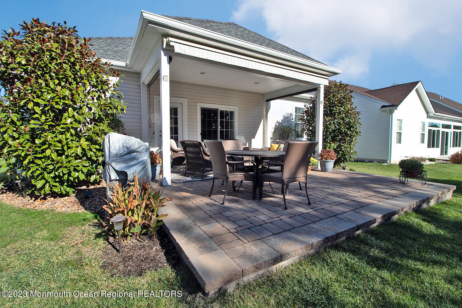 39 Bayville Way Waretown, NJ 08758 - Photo 50 of 55 a view of a house with backyard and sitting area