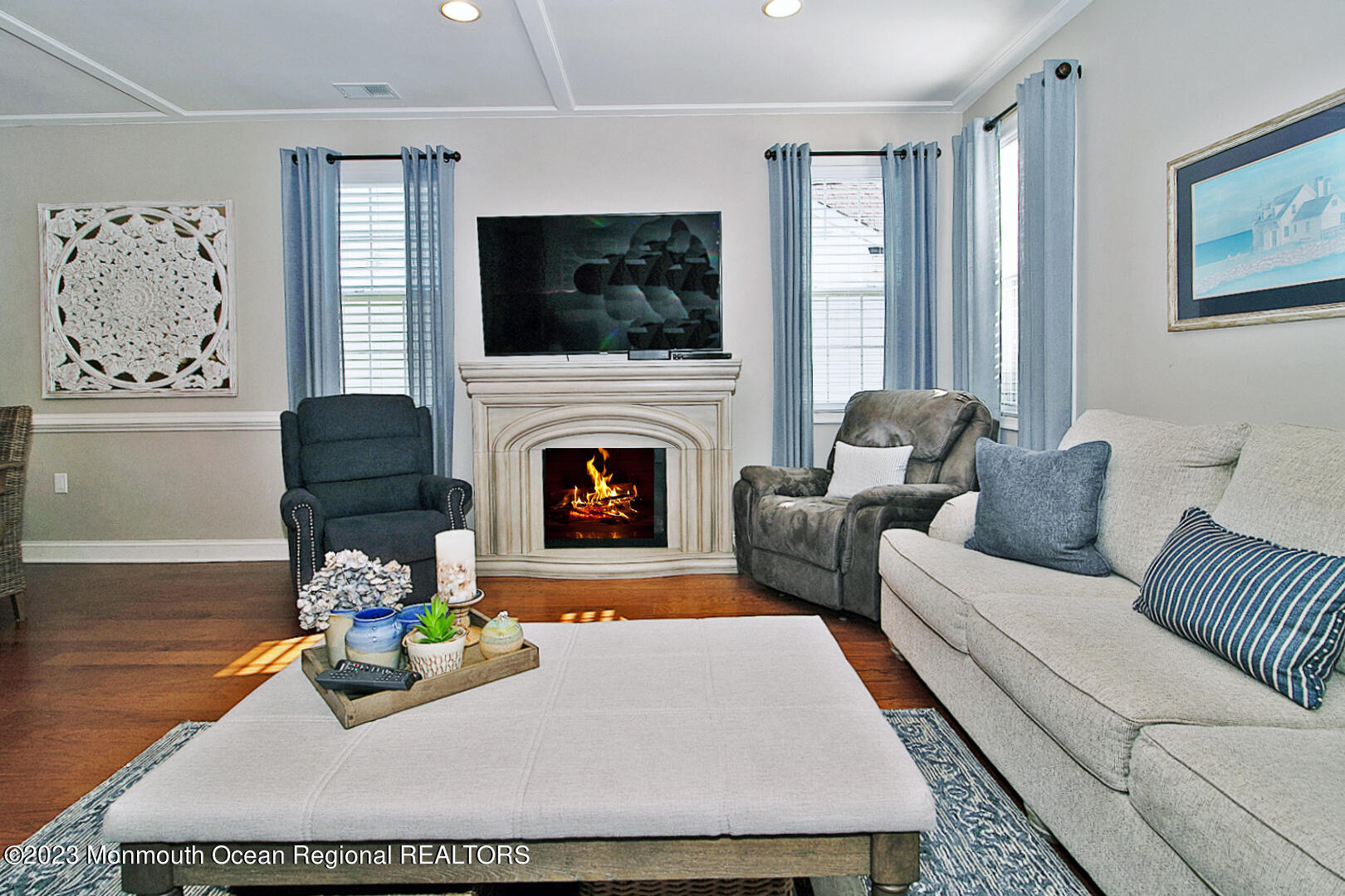 39 Bayville Way Waretown, NJ 08758 - Photo 10 of 55 a living room with furniture a flat screen tv and a fireplace