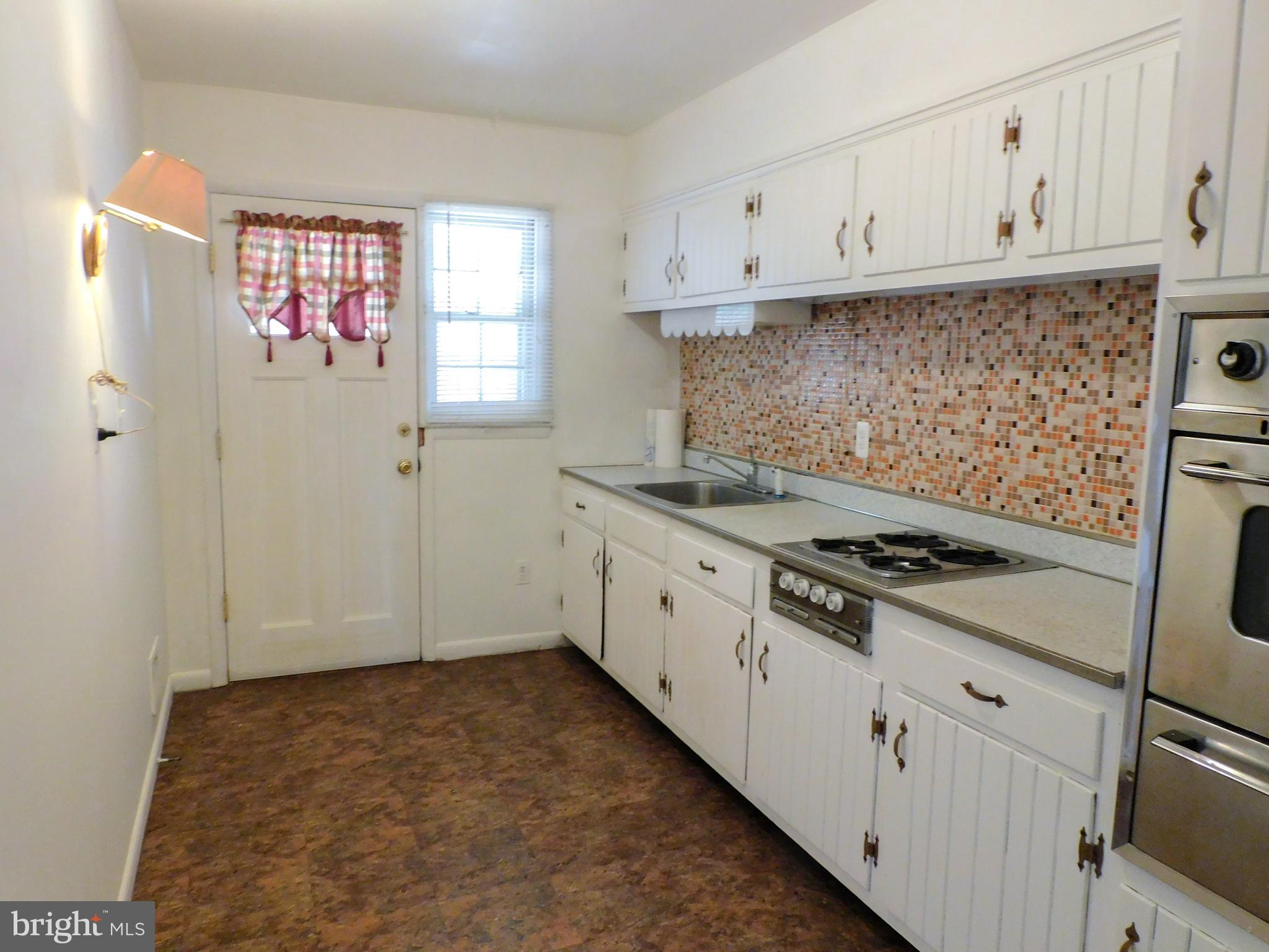 616 Queensgate Road Baltimore, MD 21229 - Photo 12 of 31 Kitchen with stick built cabinetry