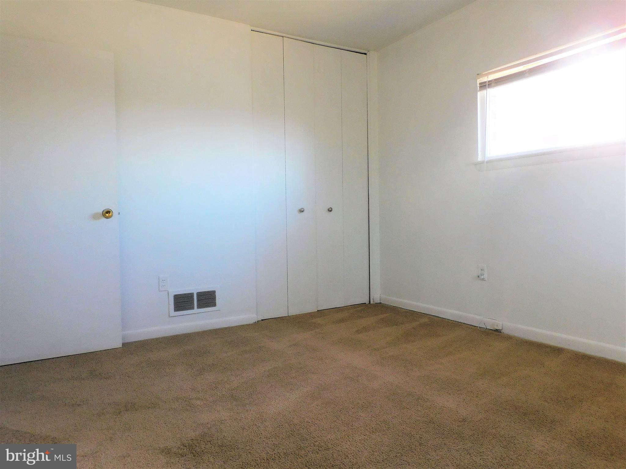 616 Queensgate Road Baltimore, MD 21229 - Photo 15 of 31 Large closet in primary bedroom