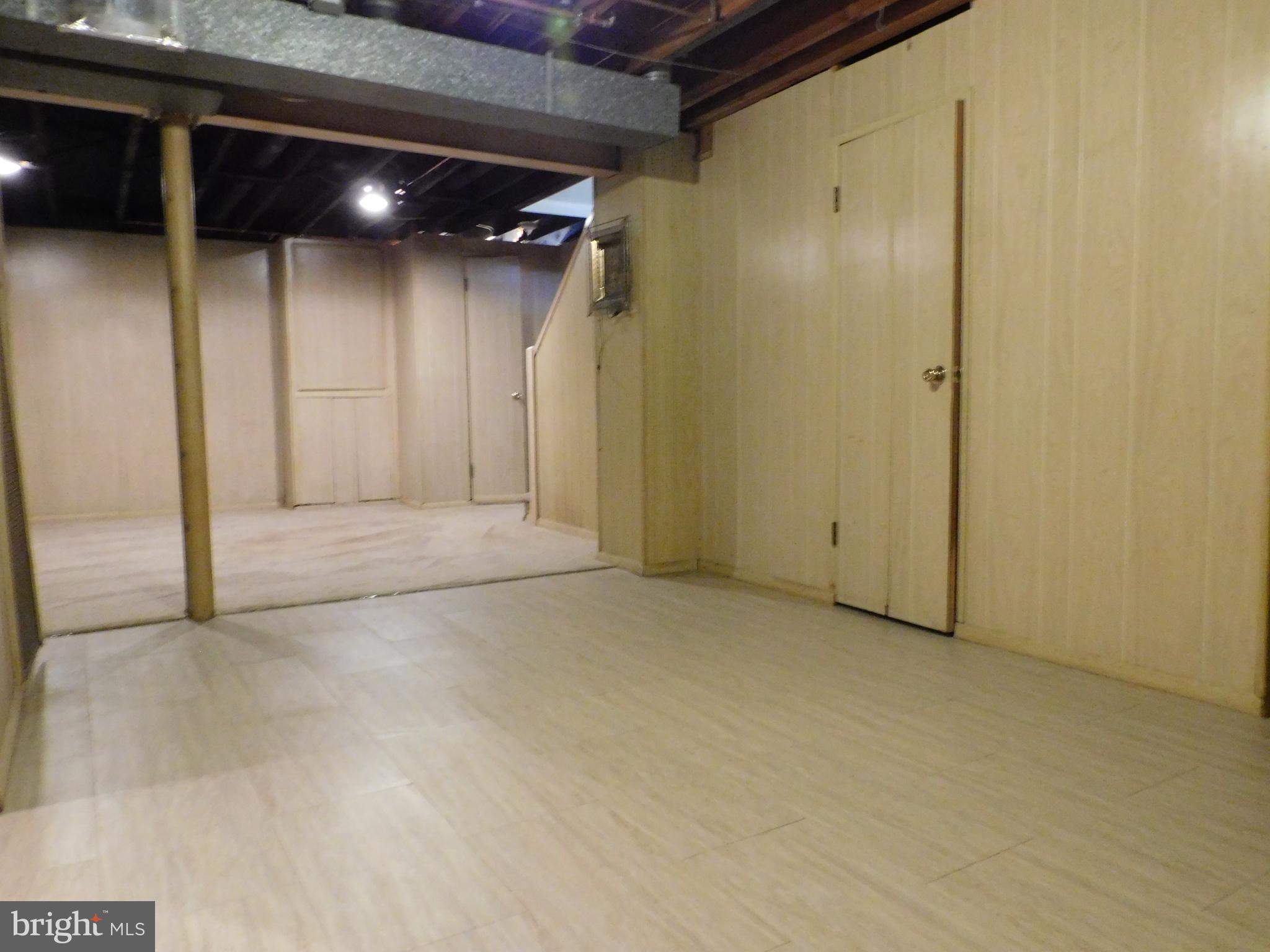 616 Queensgate Road Baltimore, MD 21229 - Photo 21 of 31 Lower level family room