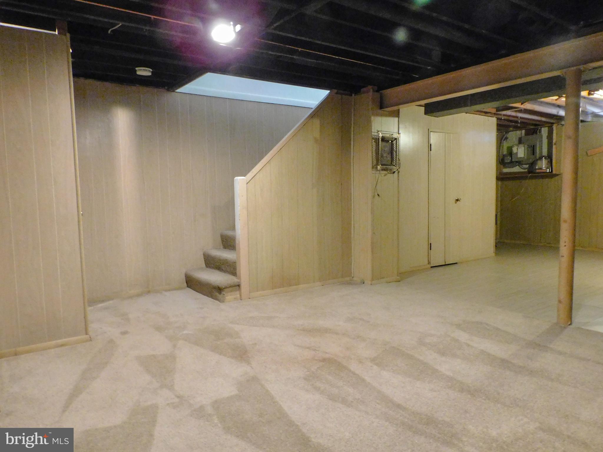 616 Queensgate Road Baltimore, MD 21229 - Photo 26 of 31 Open beam painted ceiling with recessed lighting.