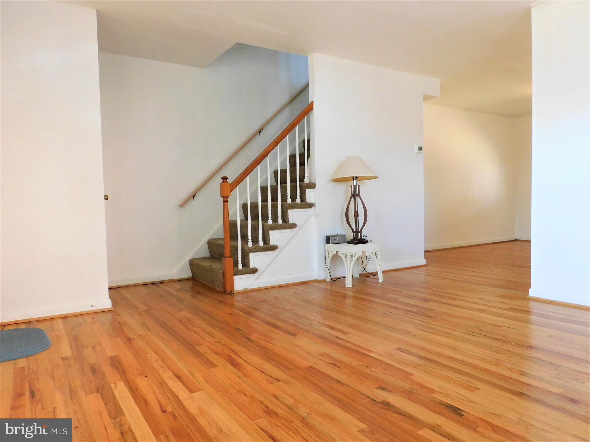 616 Queensgate Road Baltimore, MD 21229 - Photo 4 of 31 Living room w/ newer hardwoods