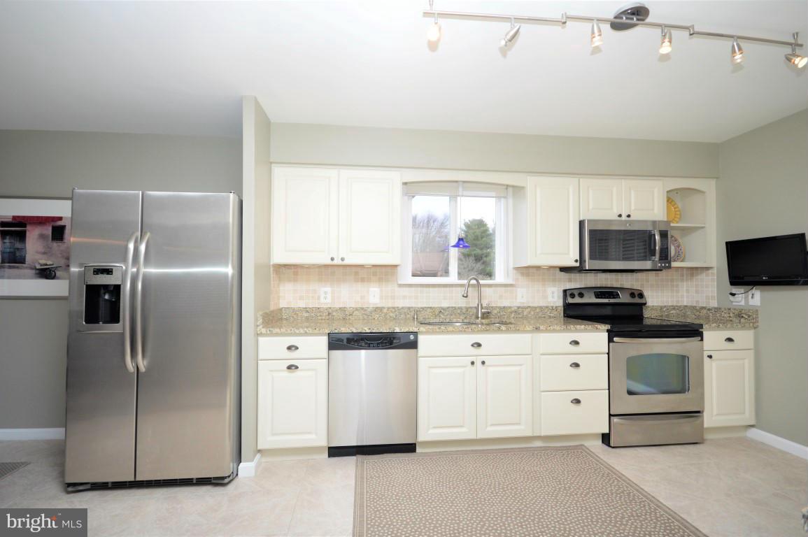 Kitchen with SS Appliances