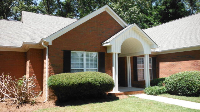 640 Lokchapee Ridge Macon, GA 31210 - Photo 1 of 22 a view of a house with a yard and plants