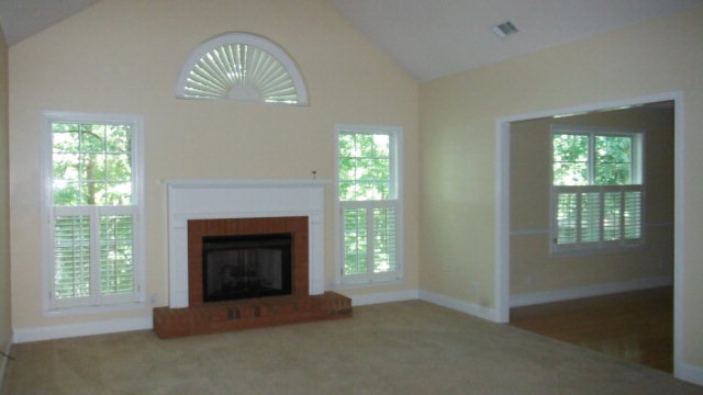 640 Lokchapee Ridge Macon, GA 31210 - Photo 15 of 22 a living room with furniture and a fireplace