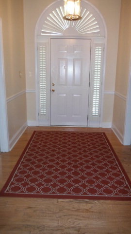 640 Lokchapee Ridge Macon, GA 31210 - Photo 5 of 22 an empty room with wooden floor chandelier and windows