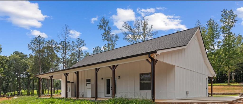 1175 Burwell Mt Zion Road Carrollton, GA 30117 - Photo 23 of 29 a view of a back yard of the house