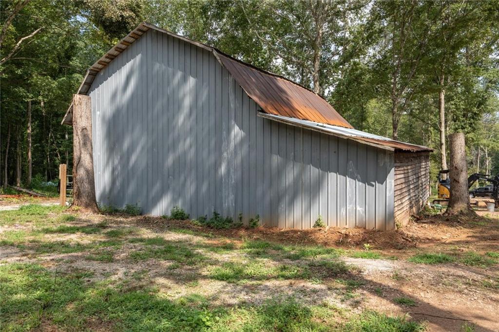 1175 Burwell Mt Zion Road Carrollton, GA 30117 - Photo 25 of 29 a backyard of a house